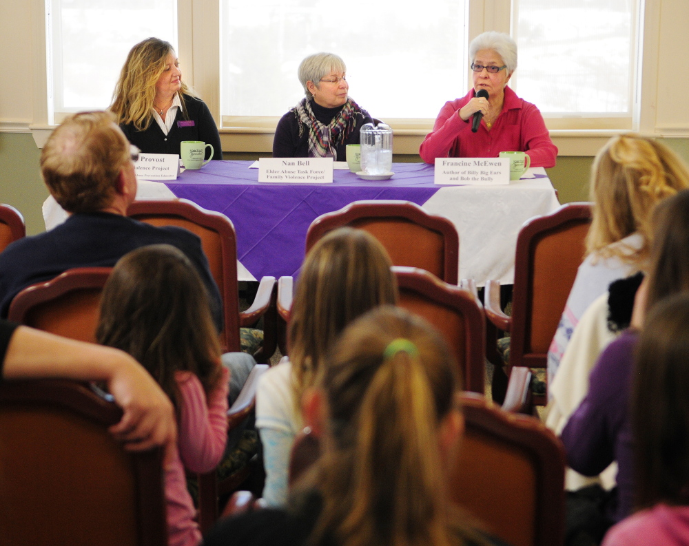 Bully alert: Nancy Provost, left, and Nan Bell, both of the Family Violence Project, and author Francine McEwen participate in a panel discussion about bullying of the elderly during an event Saturday at The Cohen Center in Hallowell.