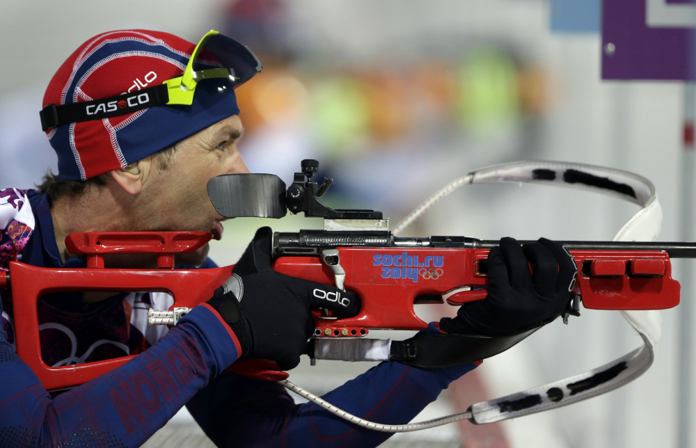 Norway’s Ole Einar Bjoerndalen gets ready to shoot during the men’s biathlon 10k sprint at the 2014 Winter Olympics on Saturday in Krasnaya Polyana, Russia.