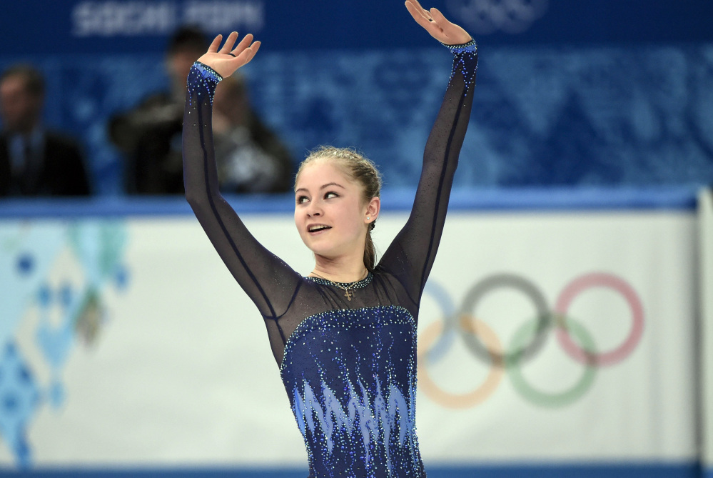 Yulia Lipnitskaya ,of Russia, waves after competing in the women’s team short program figure skating competition at the Iceberg Skating Palace during the 2014 Winter Olympics, Saturday, in Sochi, Russia.