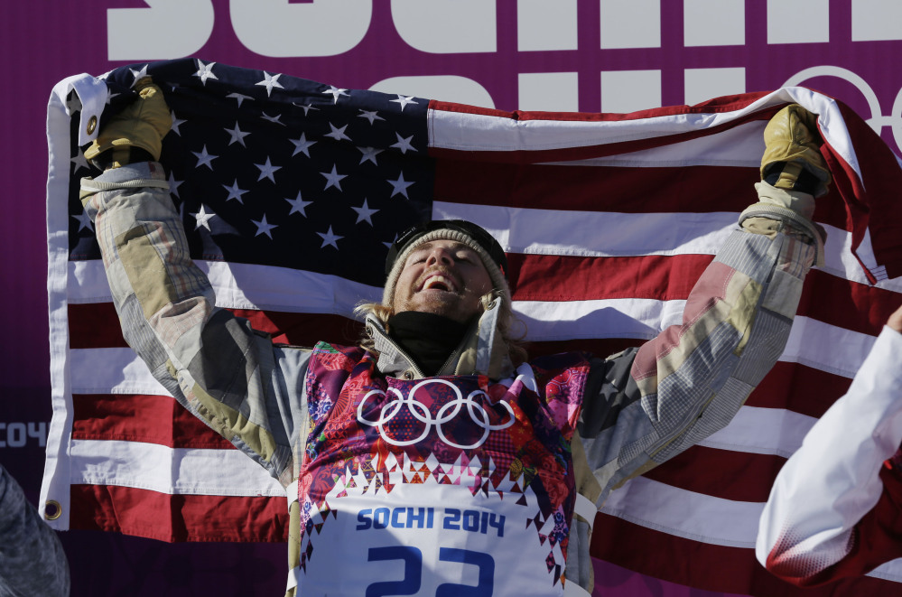 American Sage Kotsenburg celebrates after winning the men’s snowboard slopestyle final at the Rosa Khutor Extreme Park on Saturday at the Sochi Olympics.