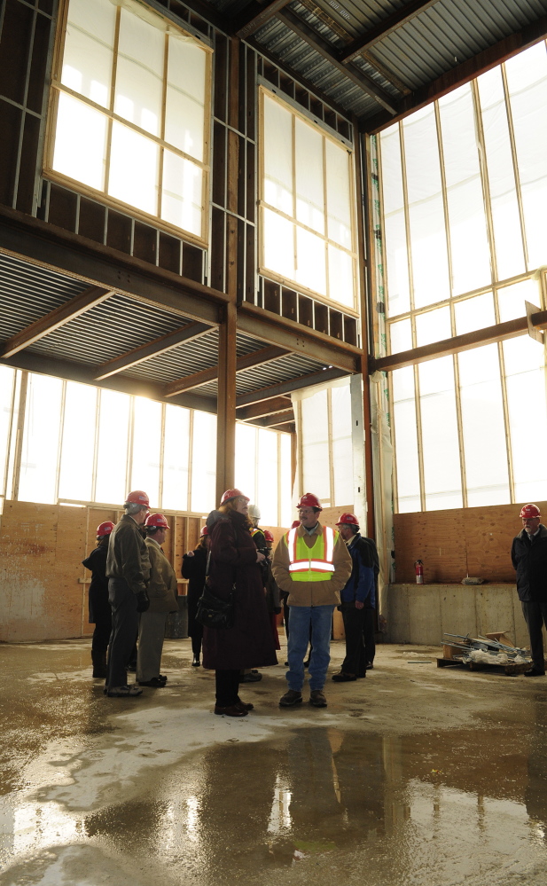 Courthouse progress: During a tour, the Legislature’s Judiciary Committee stands in the entryway of the new court building on Thursday in Augusta.