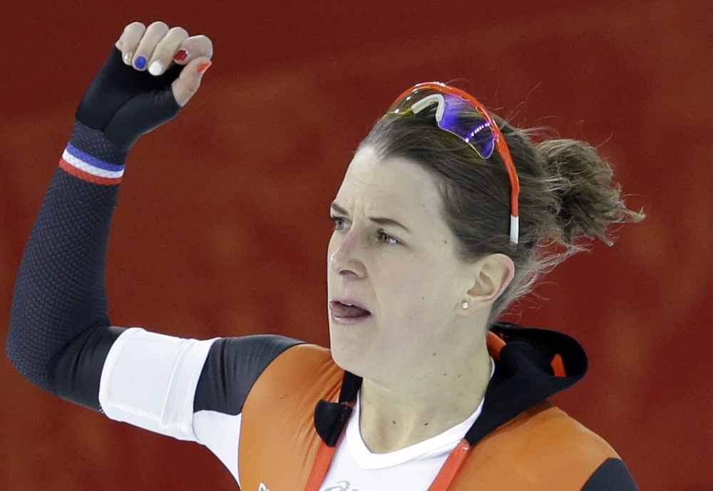 Ireen Wust of the Netherlands reacts after completing her final lap during the women’s 3,000-meter speedskating race Sunday at the Adler Arena Skating Center at the 2014 Winter Olympics in Sochi, Russia.