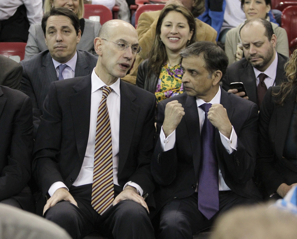 NEW GUY: Adam Silver, left, the new NBA Commissioner, talks with Sacramento Kings majority owner Vivek Ranadive. On Feb. 1 Silver replaced David Stern, who retired after 30 years as the head of the NBA.