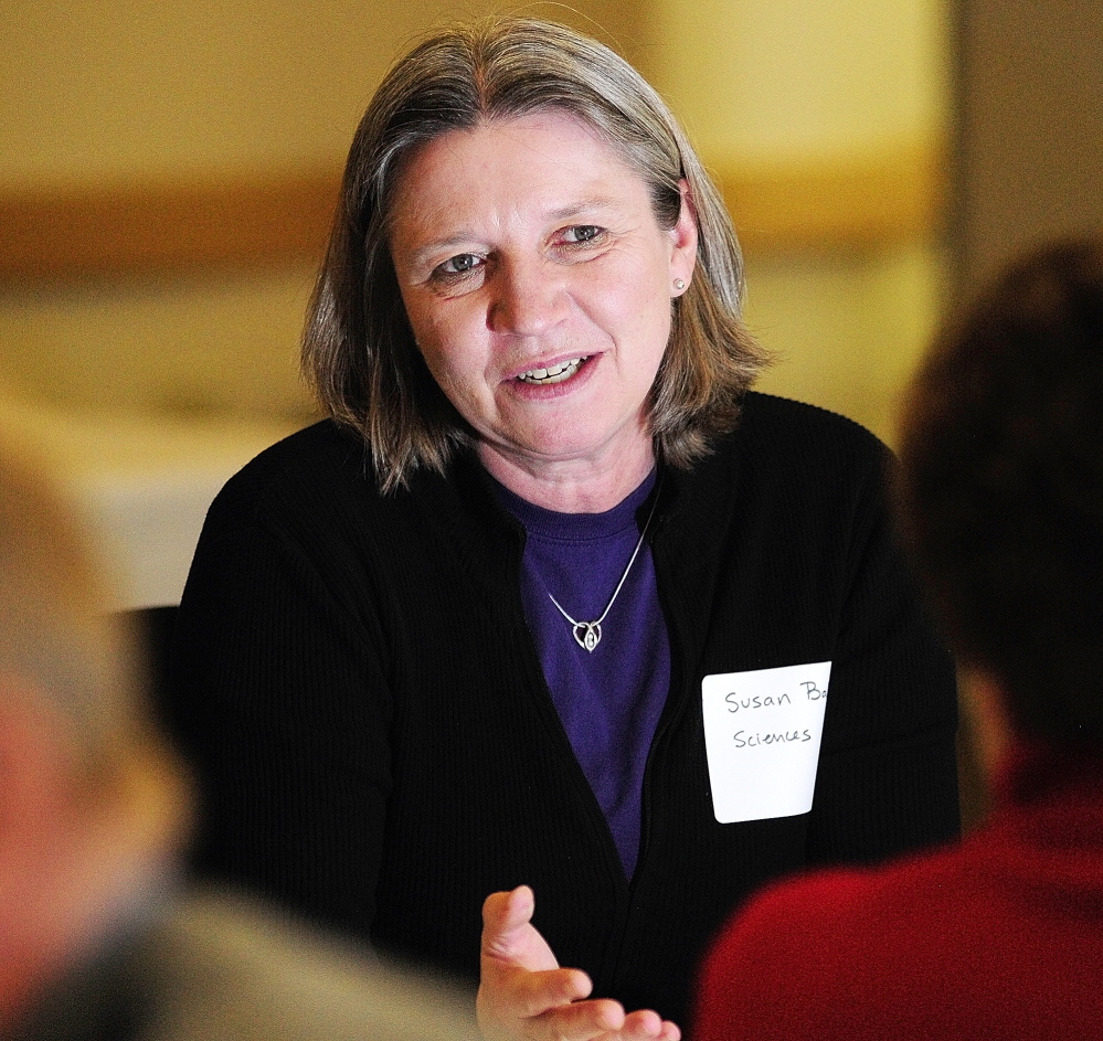 HOW TO HELP: Science professor Susan Baker talks to community leaders Tuesday in Augusta during an event arranged by the University of Maine at Augusta’s Office of Civic Engagement.