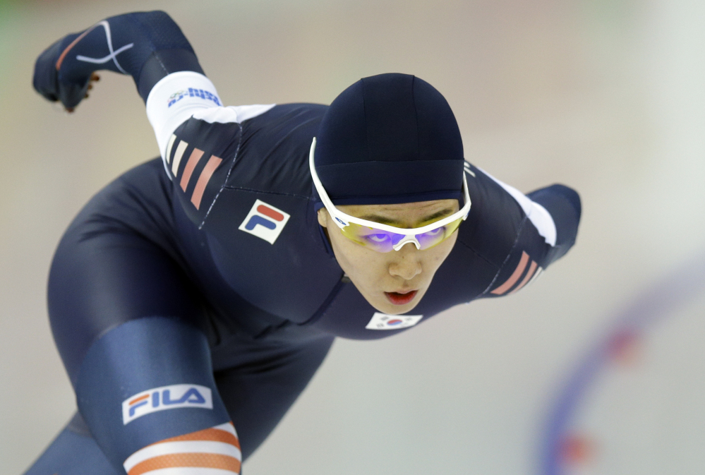 South Korea’s Lee Sang-hwa skates her way to gold during the women’s 500-meter speedskating race at the Adler Arena Skating Center during the 2014 Winter Olympics, Tuesday, in Sochi, Russia.