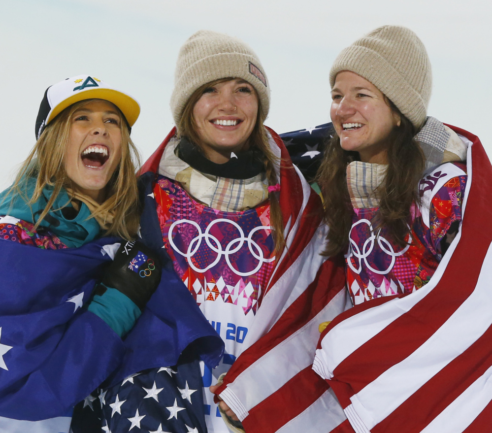 Kaitlyn Farrington, center, of the U.S. won the gold in the halfpipe Wednesday. She’s flanked by Australia’s Torah Bright (silver), left, and Kelly Clark (bronze) of the U.S.
