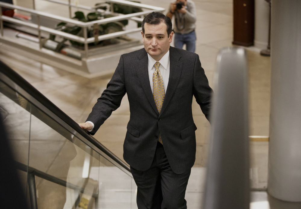 Sen. Ted Cruz, R-Texas, arrives on Capitol Hill in Washington on Wednesday as senators go to the chamber for a vote to extend the Treasury’s borrowing authority.