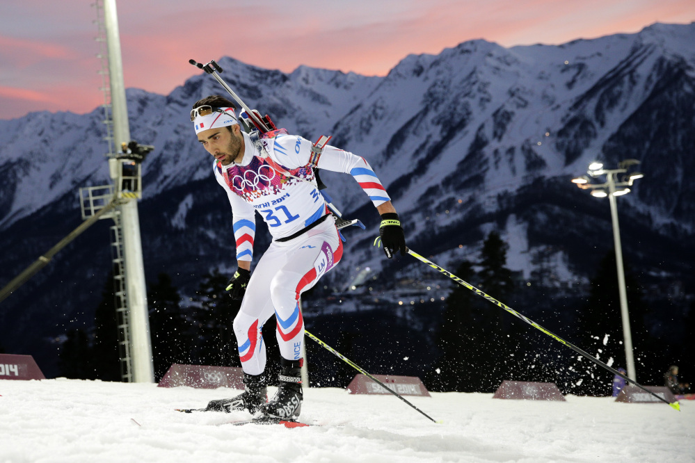 France’s Martin Fourcade competes during the men’s biathlon 20k individual race at the 2014 Winter Olympics, Thursday, Feb. 13, 2014, in Krasnaya Polyana, Russia. Fourcade won the gold medal.