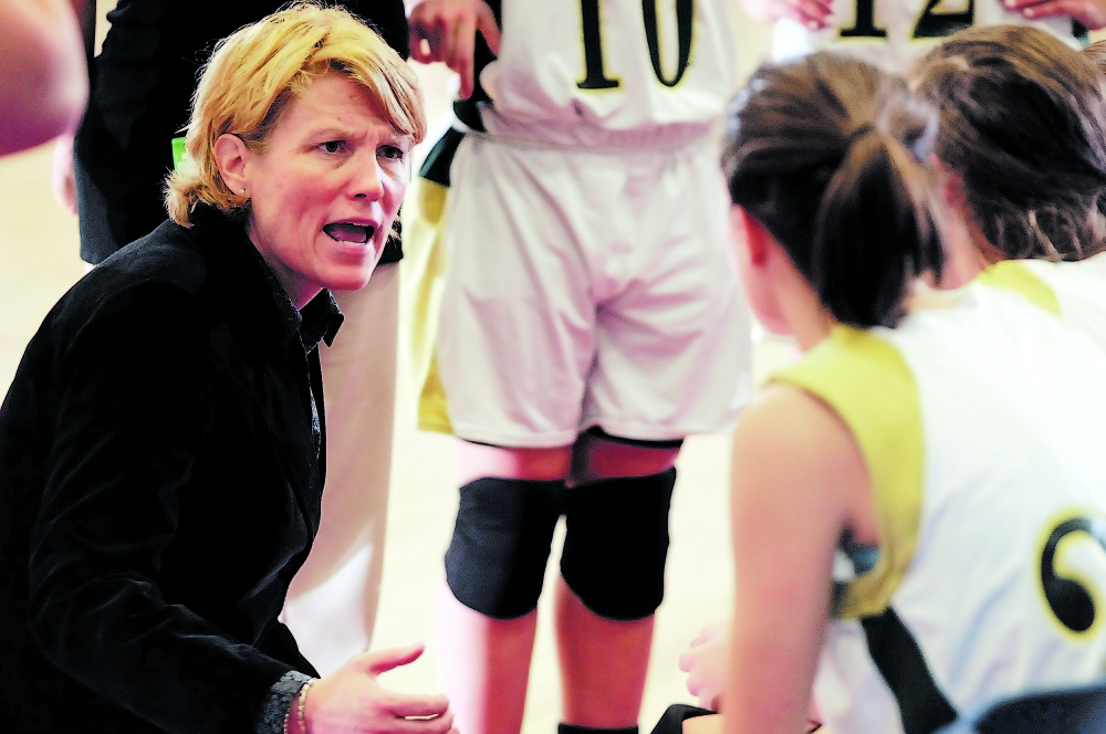 Original: Staff photo by Joe Phelan DRAW UP WINNING PLAN: Rangeley coach Heidi Deery talks to her team during a Western Maine Class D quarterfinal Tuesday at the Augusta Civic Center. Rangeley beat Kents Hill 50-26.