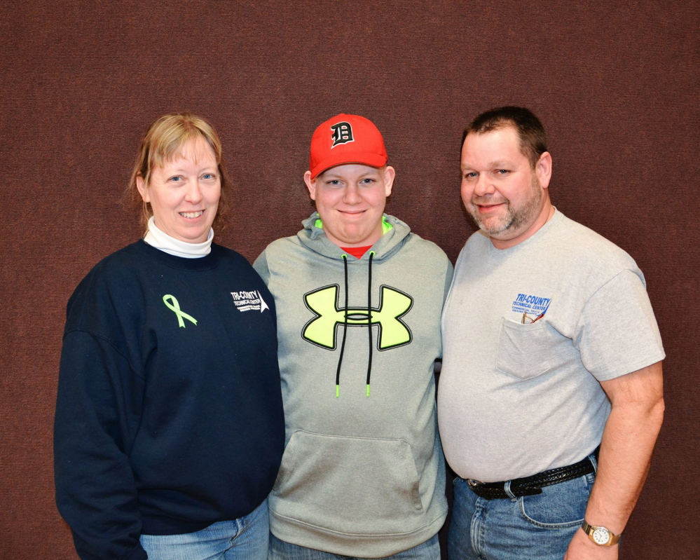 HELPING LOGAN: Gloria, Logan and Brian Bagley attend a benefit dinner in Harmony Jan. 25. Logan Bagley was recently diagnosed with Hodgkin lymphoma, a type of cancer.