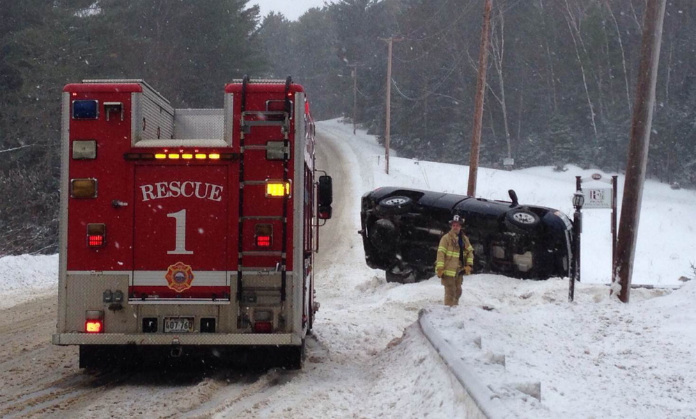 rollover: A Chevy Silverado rolled over onto its side Friday morning. The woman who was driving the truck escaped without injury.