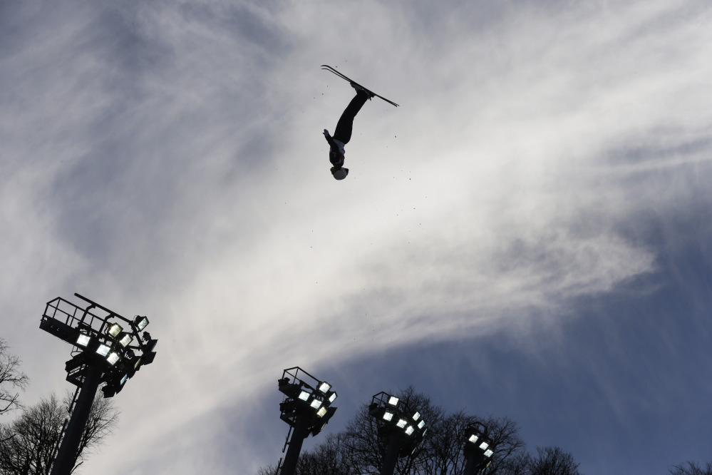 Ashley Caldwell of the United States jumps during the women’s freestyle skiing aerials qualifying at the Rosa Khutor Extreme Park, at the 2014 Winter Olympics, Friday, Feb. 14, 2014, in Krasnaya Polyana, Russia.