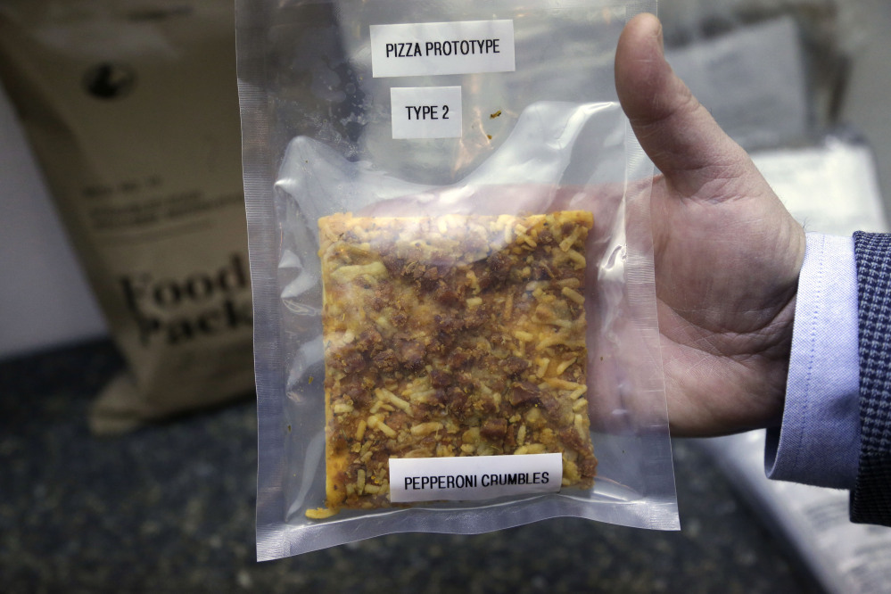 A packet containing a slice of prototype pizza is at the U.S. Army Natick Soldier Research, Development and Engineering Center, in Natick, Mass.