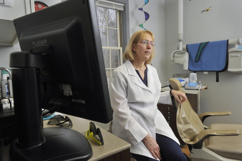 Cathy Kasprak, a dental hygienist who owns a practice in Bridgton, wants to become a dental therapist. Maine is considering a controversial bill to create the mid-level provider position, which combines the services of a hygienist with some of those offered by dentists.
