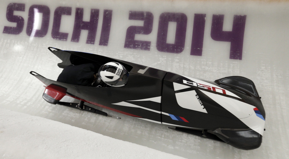 In this file photo Elena Meyers and Katie Eberling of the United States take a turn during a training session for the women’s bobsleigh at the 2014 Winter Olympics Friday.