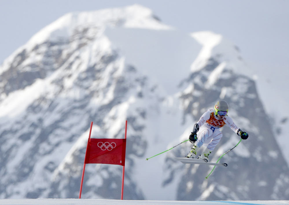 United States’ Ted Ligety makes a jump in the men’s super-G at the Sochi 2014 Winter Olympics Sunday.
