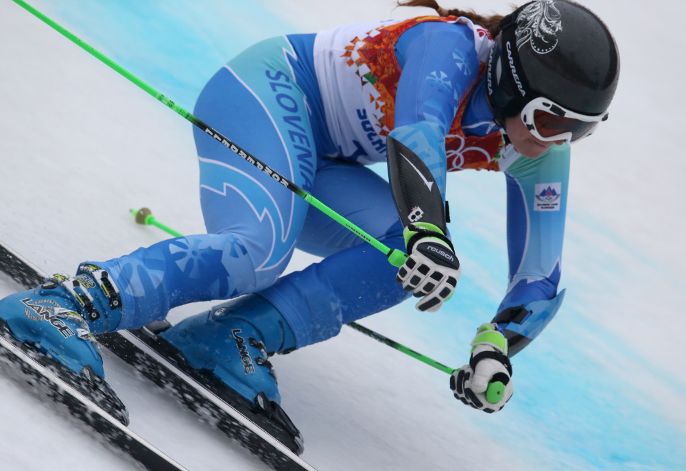Slovenia’s Tina Maze makes a turn in the second run of the women’s giant slalom to win the gold medal at the Sochi 2014 Winter Olympics, Tuesday, Feb. 18, 2014, in Krasnaya Polyana, Russia.