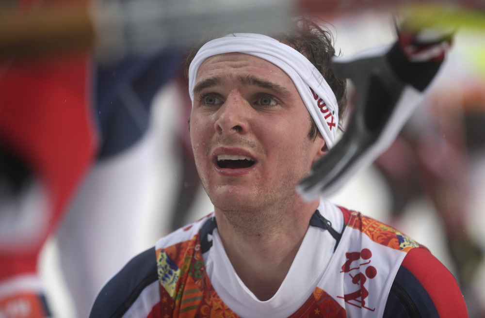 The Associated Press Norway’s Joergen Graabak is congratulated after winning the gold during the Nordic combined individual Gundersen large hill competition at the 2014 Winter Olympics, Tuesday, Feb. 18, 2014, in Krasnaya Polyana, Russia.