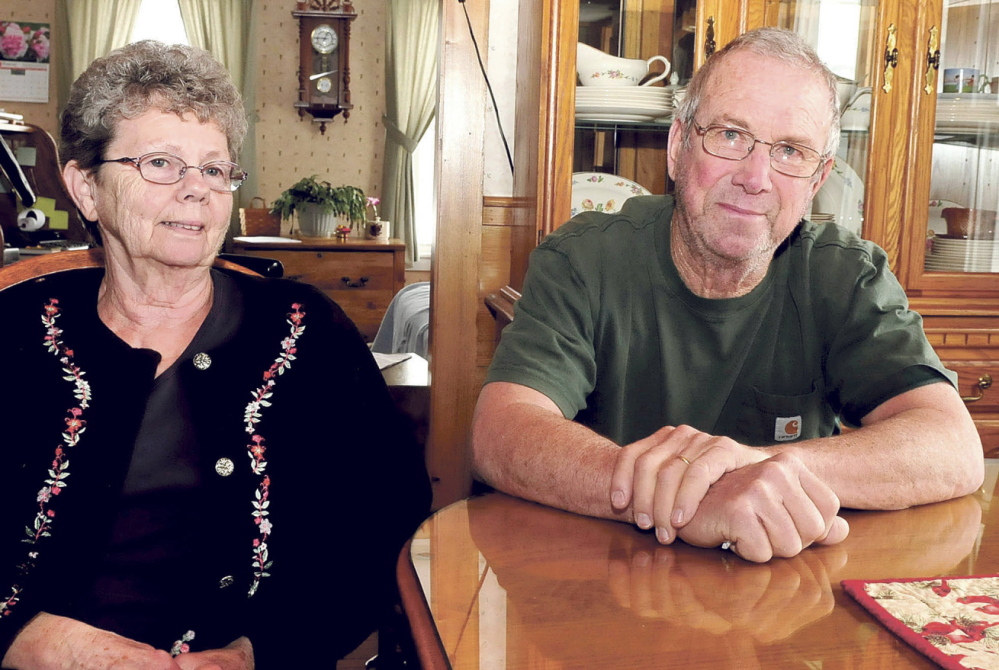 TOP FARMERS: Connie and Elroy Chartrand speak on Tuesday at their Norridgewock dairy farm about being named Producer of the Year by the Oakhurst Dairy company.