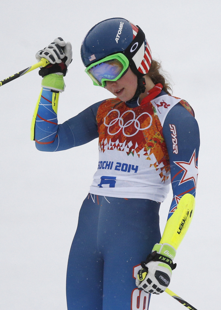 NO MEDAL: United States teenager Mikaela Shiffrin pauses in the finish area after completing her first run in the women’s giant slalom Tuesday at the 2014 Winter Olympics in Krasnaya Polyana, Russia. Shiffrin finished fifth.