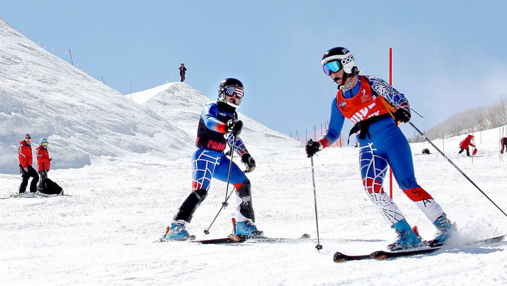 BLIND SKIER: Lindsay Ball, left, of Benton, trains with ski guide Diane Barras recently while preparing to compete in the Paralympics in Sochi in March.