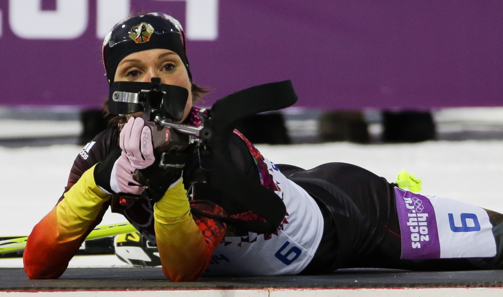 Germany’s Evi Sachenbacher-Stehle prepares to shoot during the women’s biathlon 7.5K sprint on Feb. 9 at the 2014 Winter Olympics, in Krasnaya Polyana, Russia. The German Olympic Committee said she tested positive on Monday for the stimulant methylhexanamine.