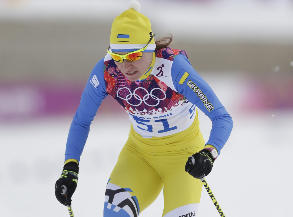 In this Tuesday, Feb. 11, 2014 photo, Marina Lisogor of Ukraine competes in the women’s cross-country sprint at the 2014 Winter Olympics in Krasnaya Polyana, Russia. The Ukrainian Olympic Committee said Saturday, Feb. 22, 2014, that Lisogor has failed a doping test.