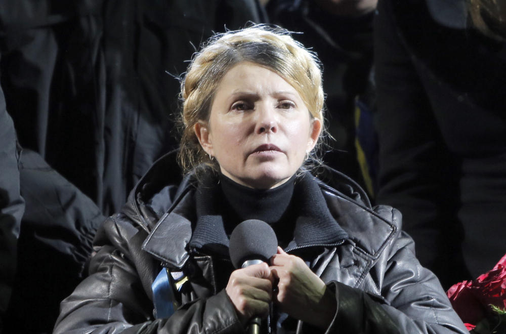 Former Ukrainian prime minister Yulia Tymoshenko addresses the crowd in central Kiev, Ukraine, Saturday. Hours after being released from prison, former Ukrainian prime minister and opposition icon Yulia Tymoshenko praised the demonstrators killed in violence this week as heroes.