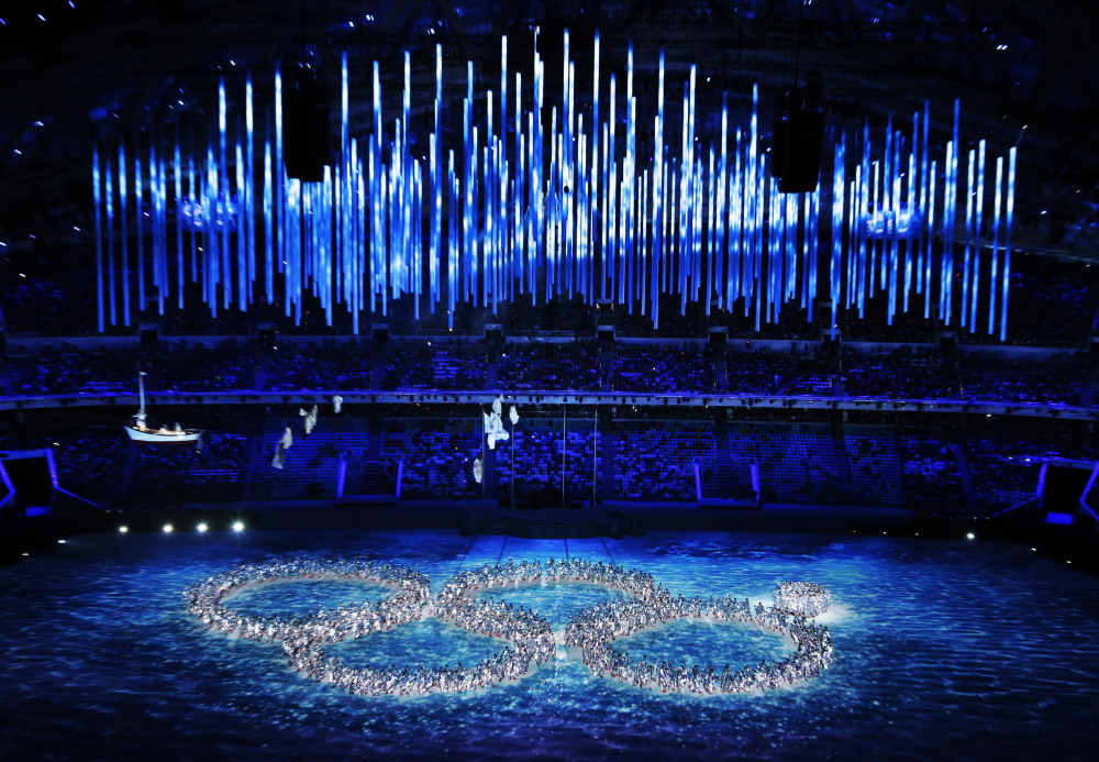 Performers recreate the ring that did not open during the opening ceremony during the closing ceremony of the 2014 Winter Olympics on Sunday in Sochi, Russia.