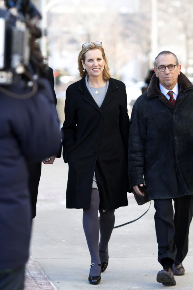 Kerry Kennedy, center, arrives, Monday at a courthouse for her trial in White Plains, N.Y. The trial is expected to last a week.
