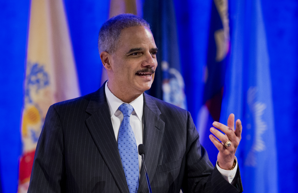 Attorney General Eric Holder speaks at the annual Attorneys General Winter Meeting in Washington on Tuesday.
