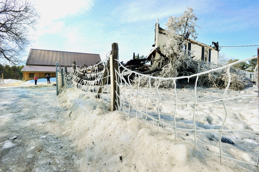 Thursday’s aftermath of a house fire at 310 Cape Road in Hollis. The historic farmhouse was destroyed.