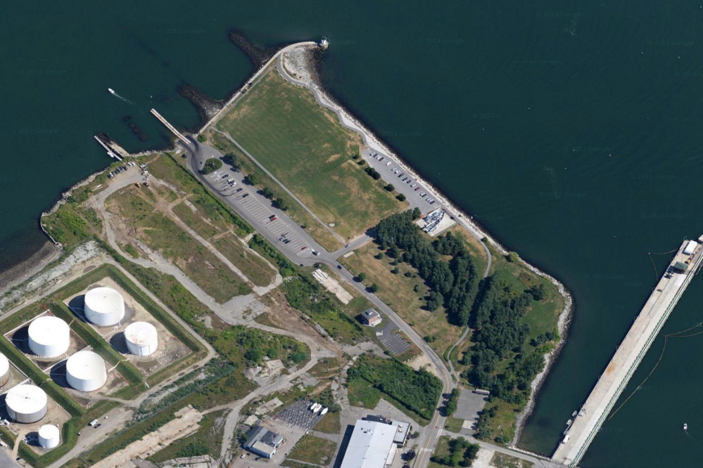 John Cacoulidis proposed building a concert venue on a tract next to Bug Light Park in South Portland, immediately above the oil tanks in this photo.