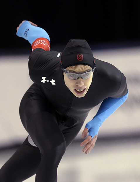 Brian Hansen competes in the men's 500 meters during the U.S. Olympic speedskating trials Saturday, Dec. 28, 2013, in Kearns, Utah. Hansen finished in third place.