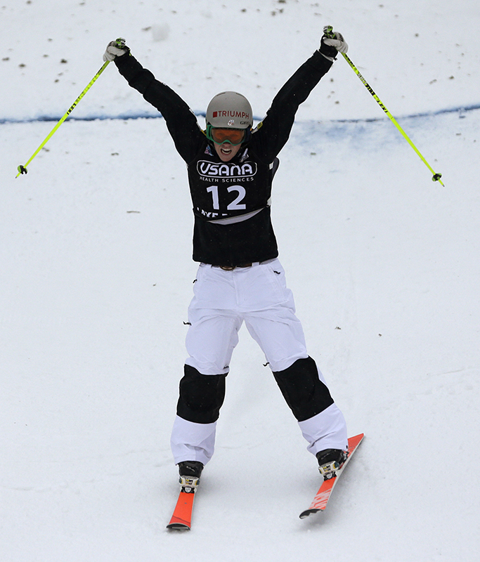 United States' Heidi Kloser celebrates her second-place finish in the women's freestyle World Cup moguls event Wednesday, Jan. 15, 2014, in Wilmington, N.Y.