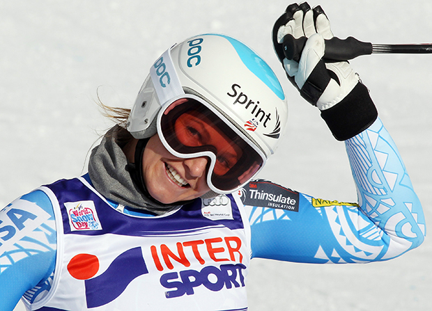 Julia Mancuso, of the United States, smiles in the finish area after completing an alpine ski, women's World Cup super-g, in Cortina d'Ampezzo, Italy, Thursday, Jan. 23, 2014. Mancuso finished in seventh place. (AP Photo/Armando Trovati)