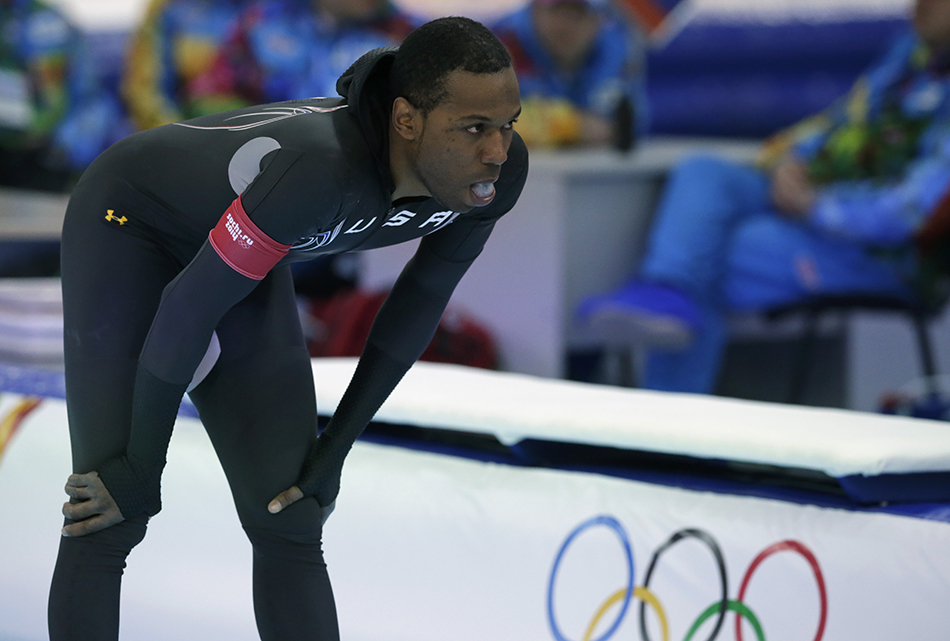 Shani Davis of the U.S. gestures in dejection after competing in the men's 1,000-meter speedskating race at the Adler Arena Skating Center during the 2014 Winter Olympics in Sochi, Russia, Wednesday, Feb. 12, 2014.
