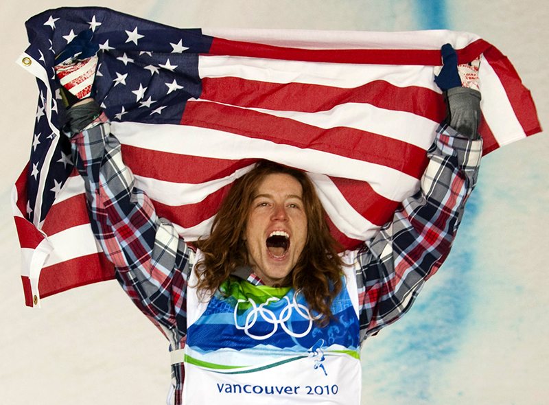 FILE - In this Feb. 17, 2010, file photo, Shaun White, of the United States, celebrates his gold medal in the men's snowboard halfpipe finals at Cypress Mountain in West Vancouver, Brtish Columbia, at the 2010 Vancouver Olympic Winter Games. White heads to the Sochi winter Olympics as arguably the most famous athlete competing: "It's going to push me to do things I never would've done before," he says.