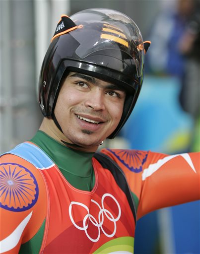 FILE - In this Feb. 12, 2006 file photo, India's Shiva Keshavan acknowledges the crowd after finishing his third run of the Men's Singles Luge at the Turin 2006 Winter Olympic Games in Cesana Pariol, Italy. Keshavan, India's top competitor at the upcoming 2014 Winter Olympics in Sochi says not being able to compete under the national flag because of a political dispute will not harm his performance. (AP Photo/David J. Phillip, File)