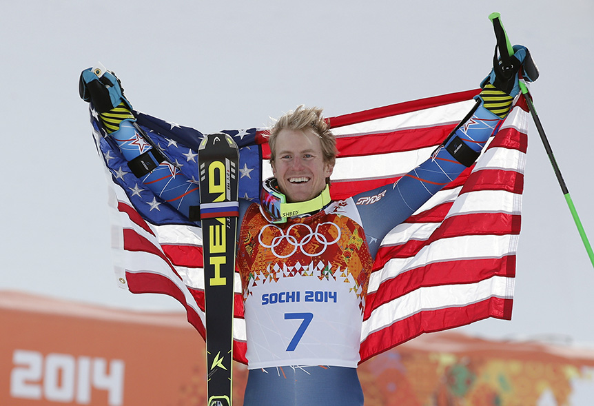 Men's giant slalom gold medalist Ted Ligety of the United States poses for photographers on the podium at the Sochi 2014 Winter Olympics, Wednesday, Feb. 19, 2014, in Krasnaya Polyana, Russia. (AP Photo/Christophe Ena) 2014 Sochi Olympic Games;Winter Olympic games;Olympic games;Spor