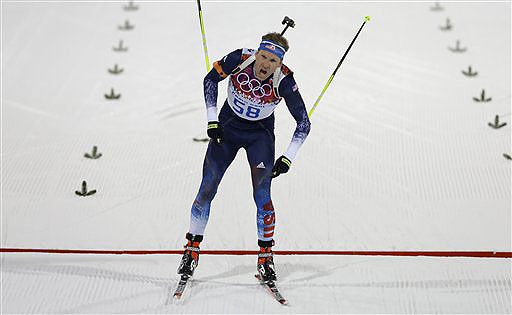Lowell Bailey of Lake Placid, N.Y., crosses the finish line of the men's biathlon 20k individual race at the 2014 Winter Olympics on Feb. 13. He finished eighth, the best finish ever by an American.