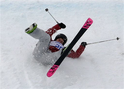 Canada's Yuki Tsubota crashes on her last run in the women's freestyle skiing slopestyle final at the Rosa Khutor Extreme Park, at the 2014 Winter Olympics, Tuesday, Feb. 11, 2014, in Krasnaya Polyana, Russia.