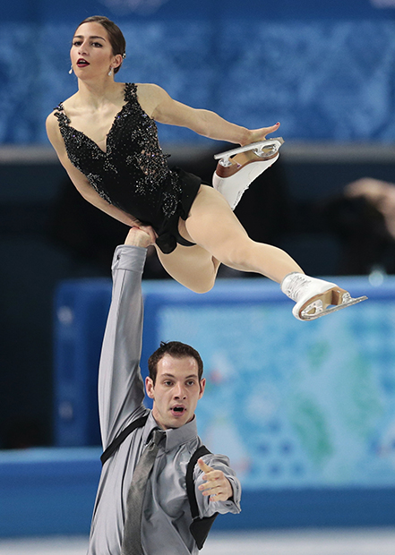 Marissa Castelli and Simon Shnapir of the United States compete in the team pairs free skate figure skating competition at the Iceberg Skating Palace during the 2014 Winter Olympics, Saturday, Feb. 8, 2014, in Sochi, Russia.