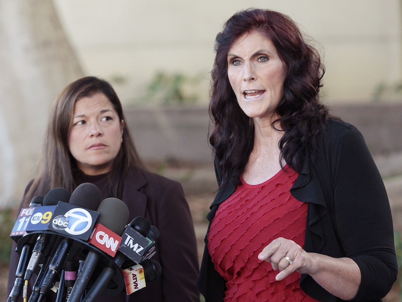 This Sept. 20, 2012 file photo shows Cindy Lee Garcia, right, one of the actresses in the film "Innocence of Muslims," and attorney M. Cris Armenta at a news conference before a hearing at Los Angeles Superior Court in Los Angeles. A federal appeals court ordered YouTube on Wednesday to take down an anti-Muslim film that sparked violence in many parts of the Middle East. The decision by a divided three-judge panel of the 9th U.S. Circuit Court of Appeals in San Francisco reinstated a lawsuit filed against YouTube by an actress who appeared in the video. The 9th Circuit said the YouTube posting infringed actress Cindy Lee Garcia's copyright to her role, and she, not just the filmmaker, could demand its removal.