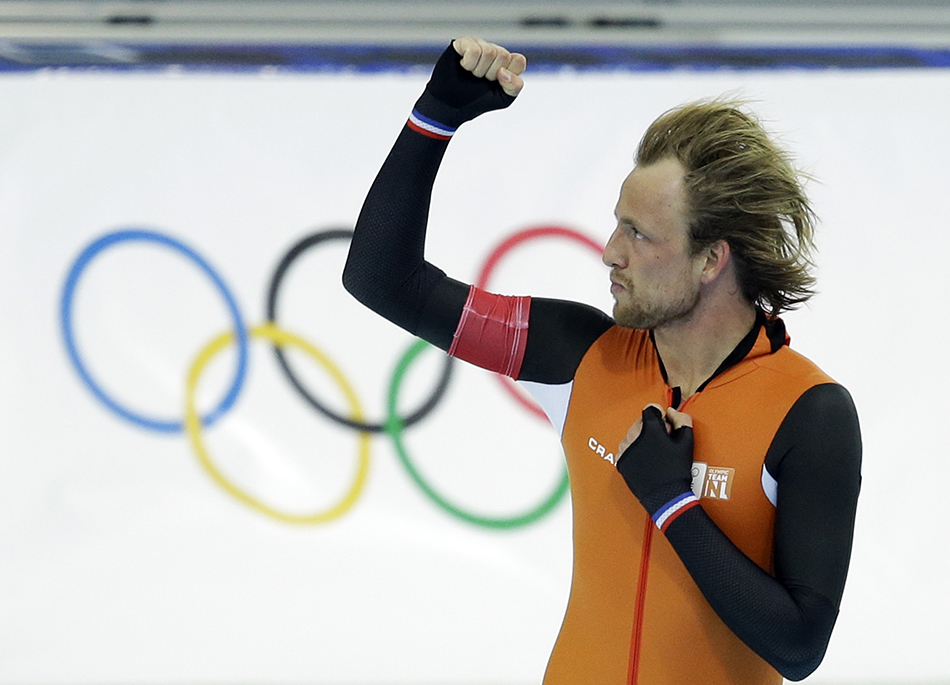 Gold medallist Michel Mulder from the Netherlands clenches his fist after his second heat race in the men's 500-meter speedskating race at the Adler Arena Skating Center during the 2014 Winter Olympics, Monday, Feb. 10, 2014, in Sochi, Russia. (AP Photo/Patrick Semansky) 2014 Sochi Olympic Games;Winter Olympic games;Olympic games;Spor