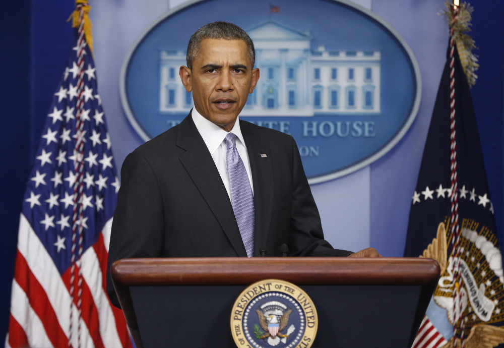 President Barack Obama arrives to speak about Ukraine in the James Brady Press Briefing Room at the White House in Washington, Friday.