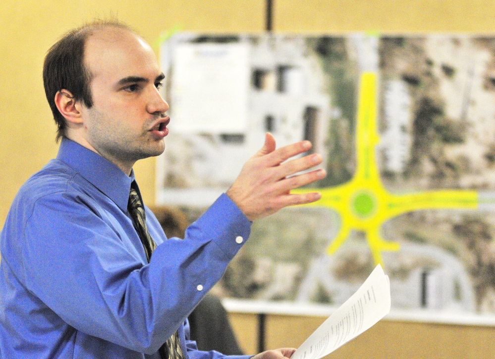 HOW IT WORKS: Jonathan French, a designer for the Department of Transportation, speaks on Tuesday at Helen Thompson School in West Gardiner during a public meeting held to hear reaction to a planned roundabout.
