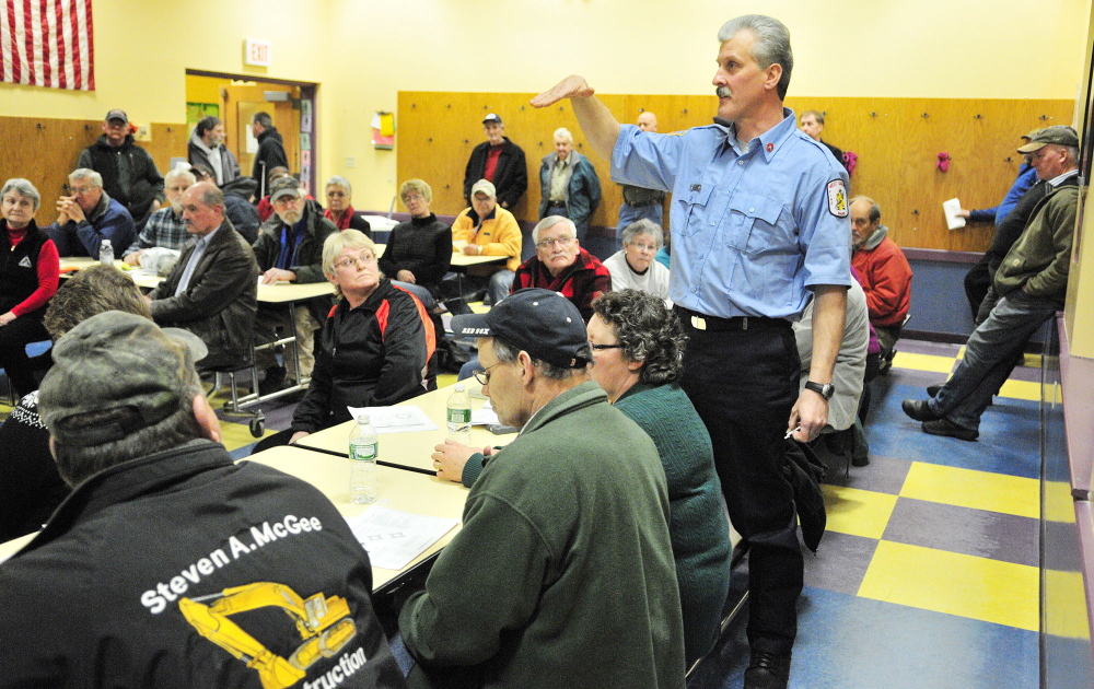 CONCERN: Mike Dovinsky speaks during a public meeting held Tuesday at Helen Thompson School in West Gardiner by the state Department of Transportation to hear reaction to a planned roundabout.