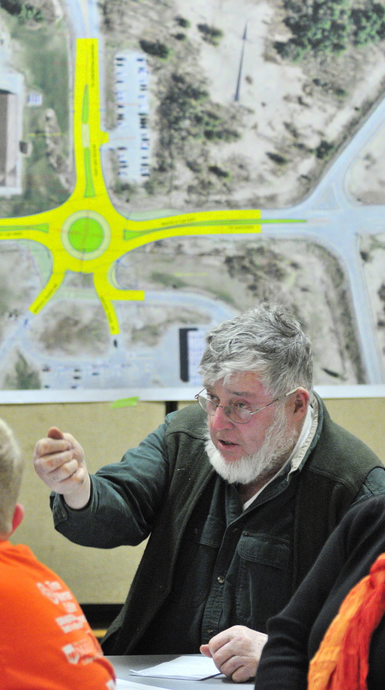 UNCERTAINTY ABOUNDS: John Marsh speaks during a public meeting held Tuesday at Helen Thompson School in West Gardiner by the state Department of Transportation to hear reaction to a planned roundabout.