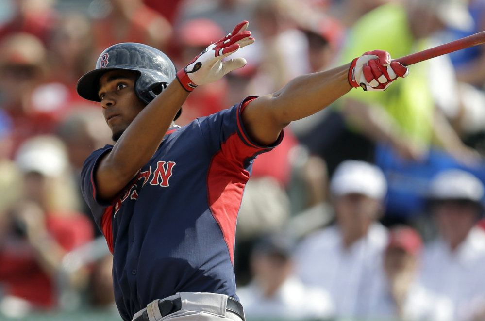BIG HIT: Boston Red Sox shortstop Xander Bogaerts watches his two-run home run during the sixth inning Wednesday of an exhibition game against the St. Louis Cardinals in Jupiter, Fla. The Cardinals won 8-6.